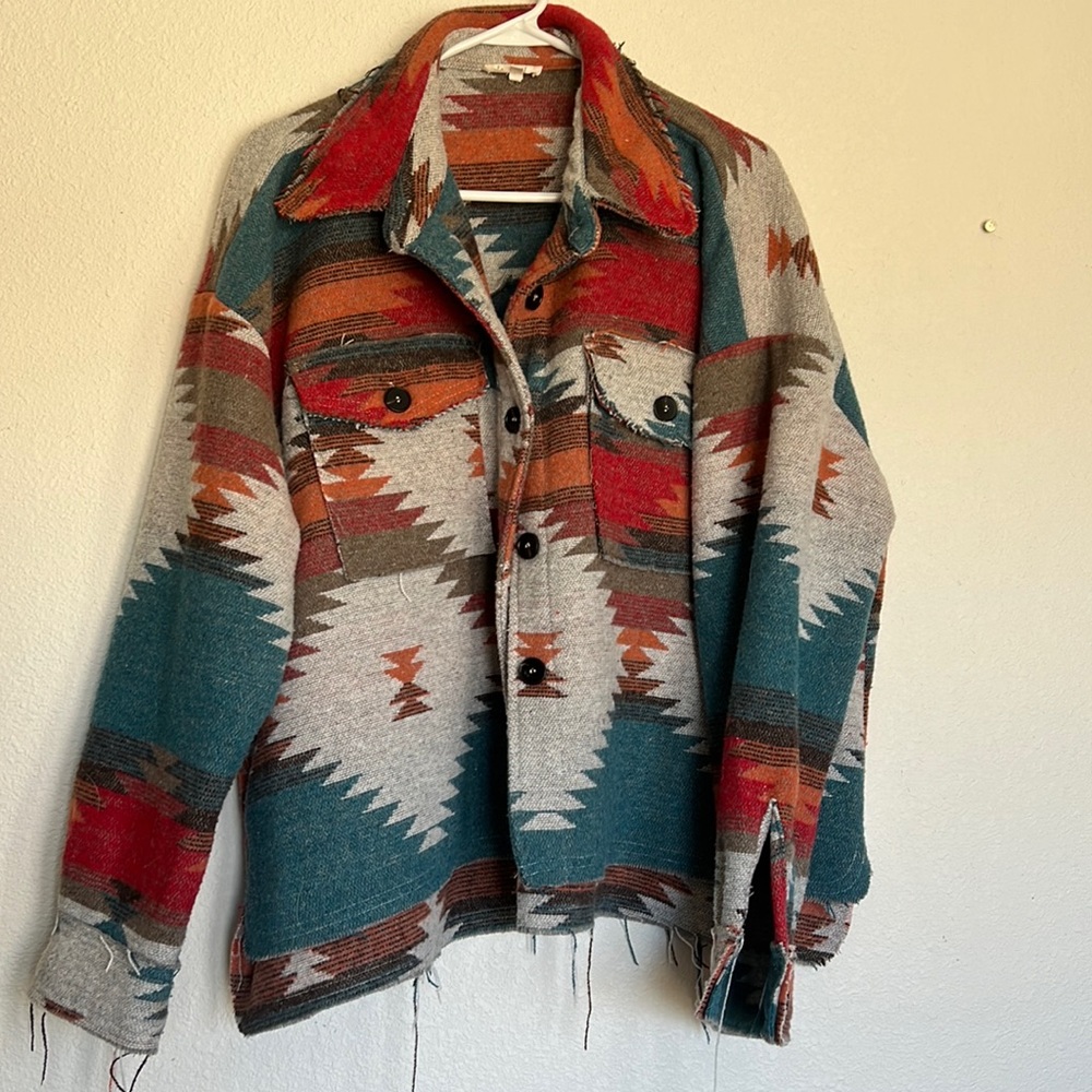 Warm and stylish shacket style top.